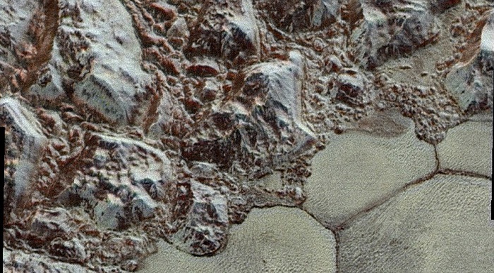 Now in super high-res color! NASA shows off enhanced zoom-in pics of Pluto